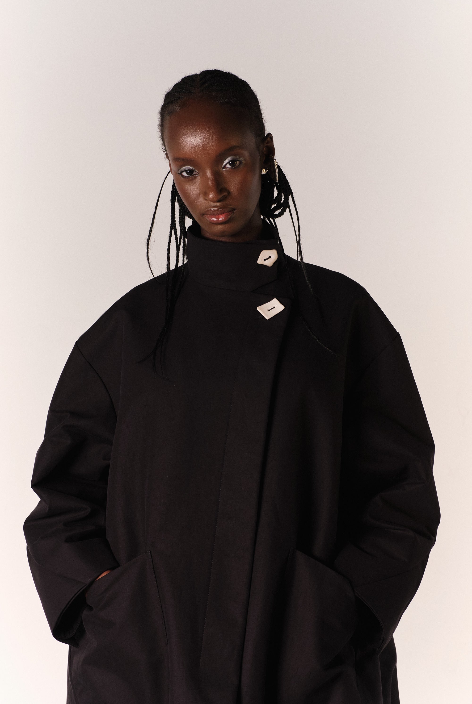 CHLOE WEARING THE HILDA COAT IN BLACK DEADSTOCK COTTON