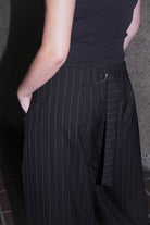 DETAIL IMAGE OF BLACK WOOL BLEND DALE PANTS ON MODEL