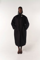 BLACK HILDA COAT MADE FROM DEADSTOCK COTTON FABRIC ON MODEL CHLOE