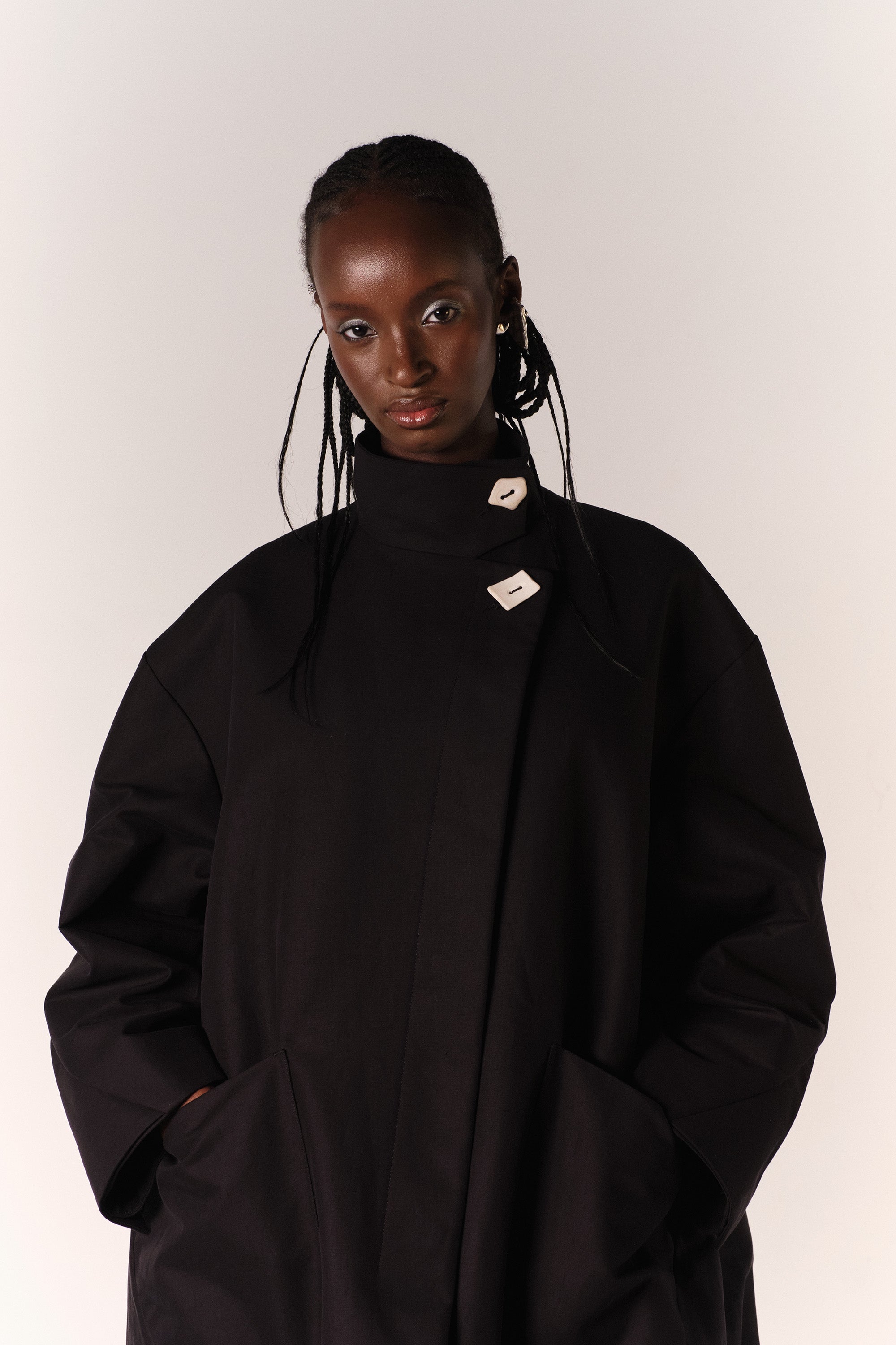 CHLOE WEARING THE HILDA COAT IN BLACK DEADSTOCK COTTON